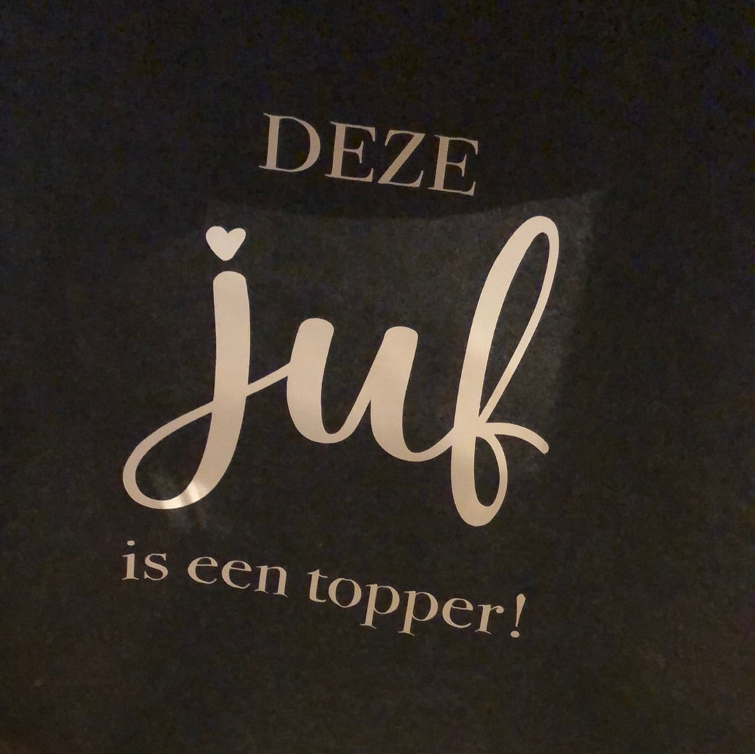 Vilten tas met tekst