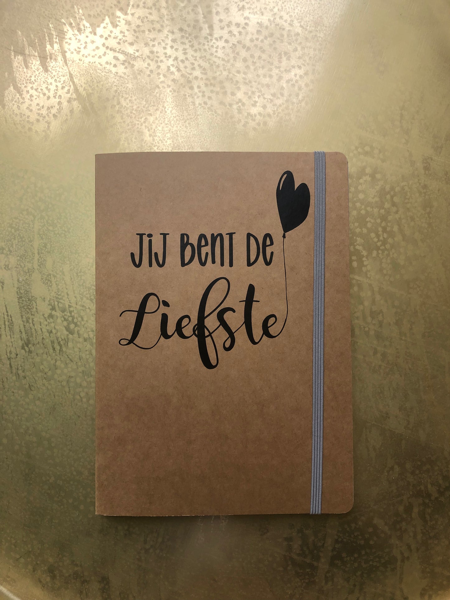 Notitieboek A5 bruin met tekst